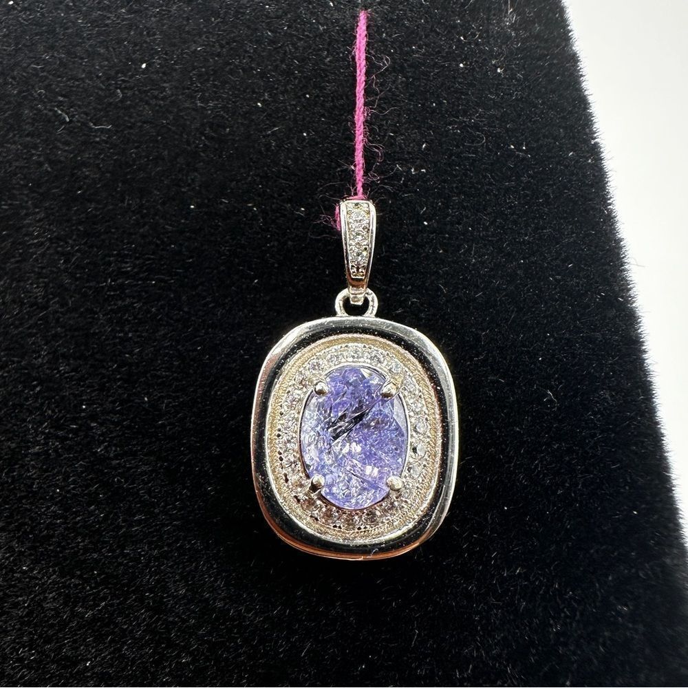 Genuine 8x6mm, 1.03ct oval cut tanzanite with cz accents in s925 marked pendant!